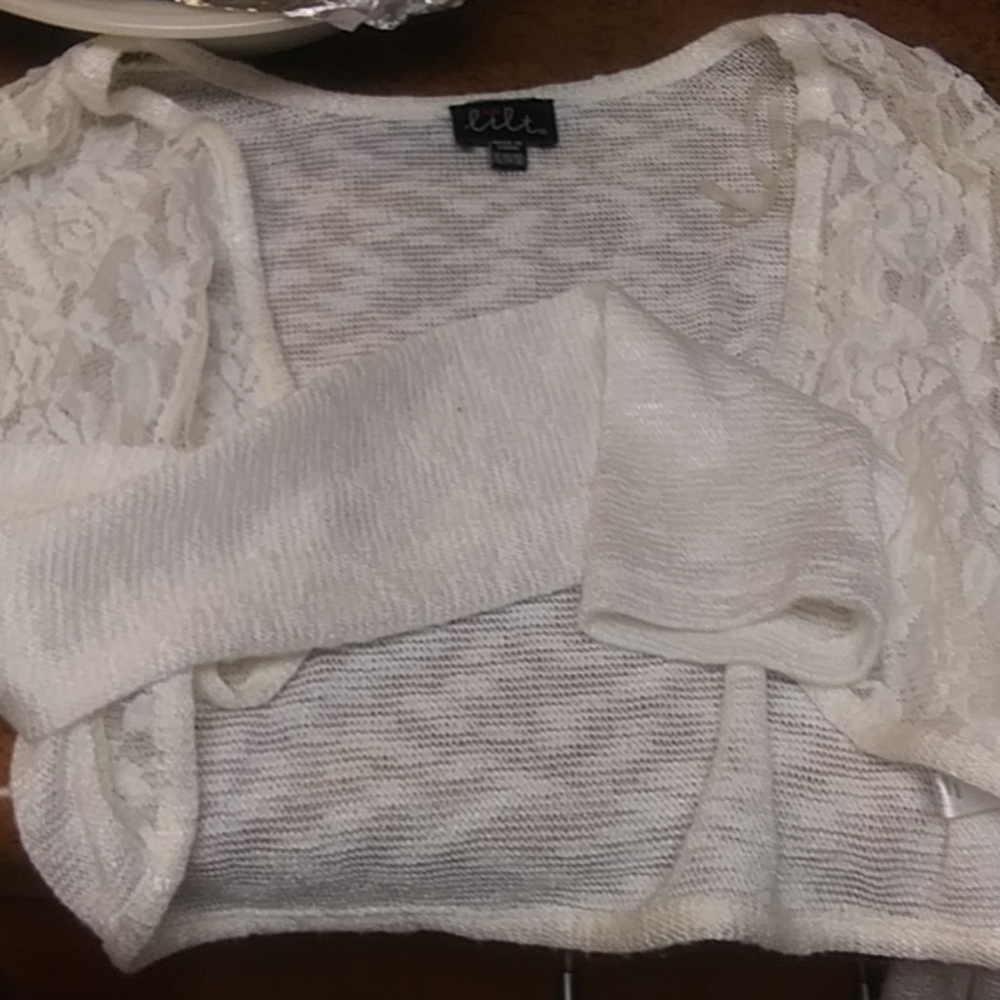 A white blouse it can be over a drees